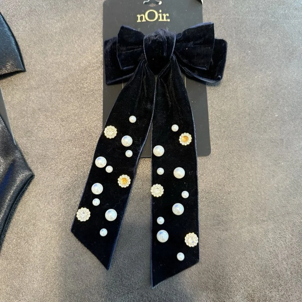 nOir Jewelry add romantic